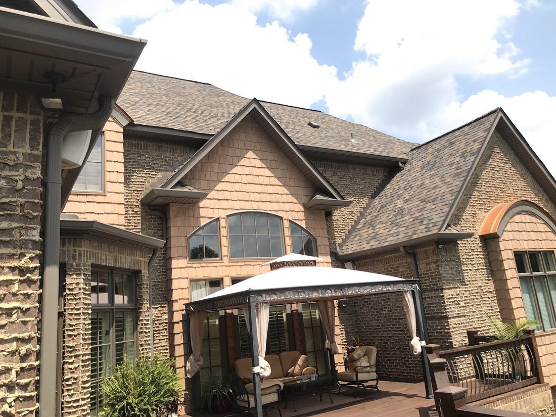 New roof and gutters installed by Vest Construction