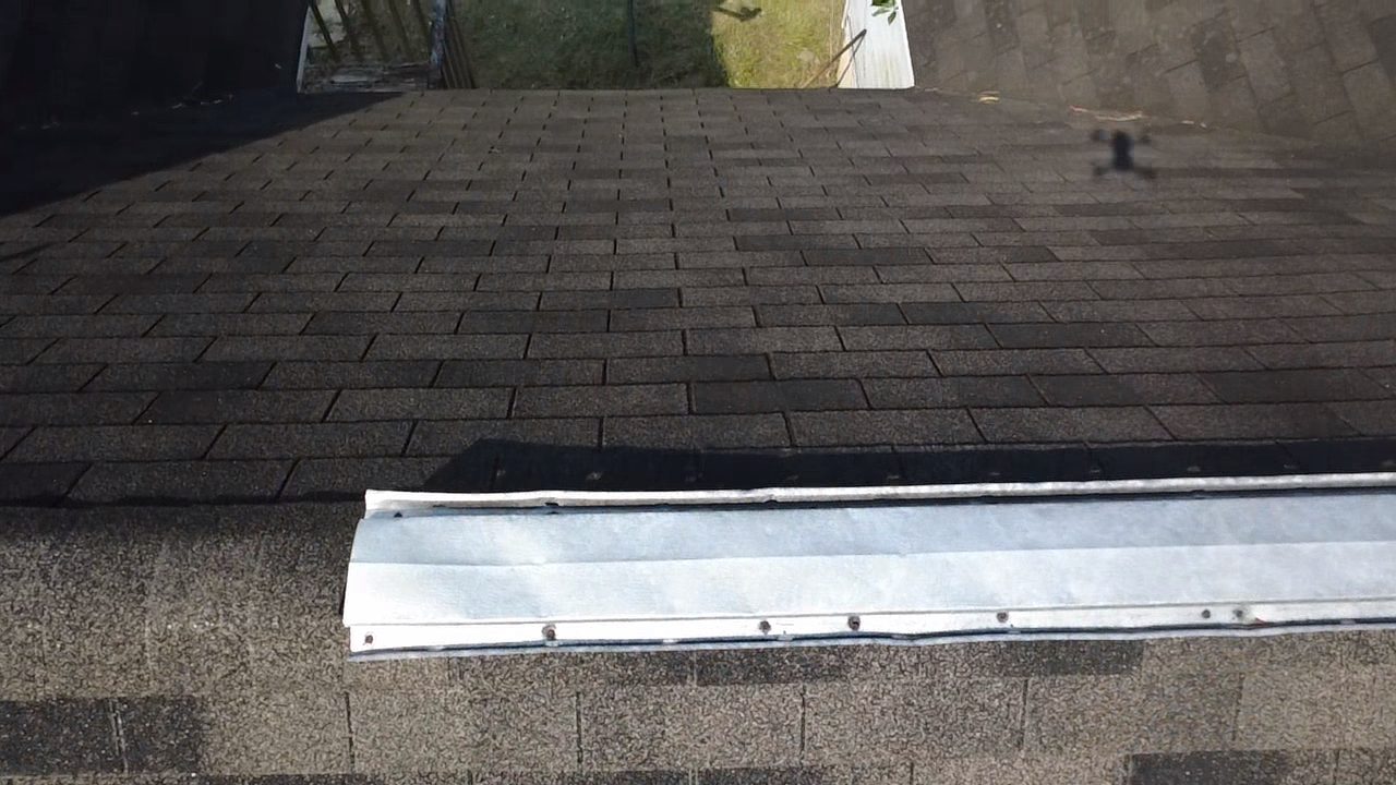Inspection photo of the roof edge, drip edge, and eave detail
