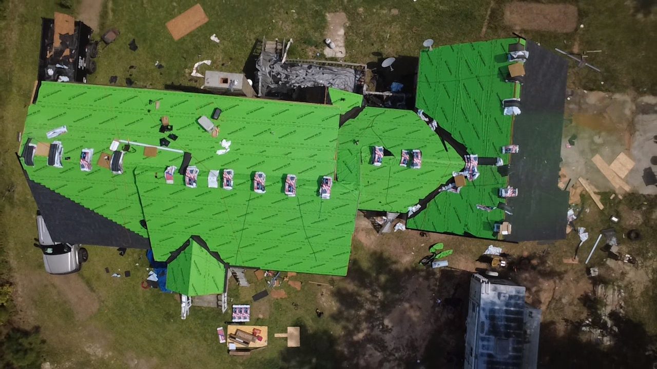 Aerial view of synthetic underlayment installed during a roof replacement in Georgia