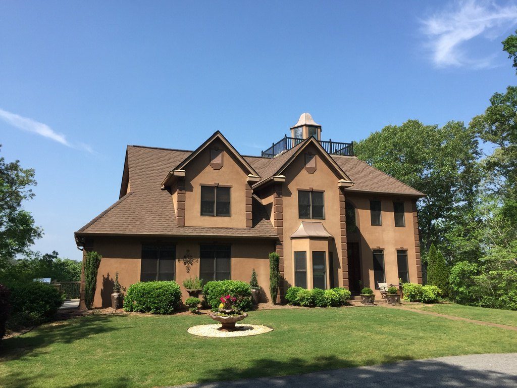 Full roof tear-off and replacement in progress on a Georgia home